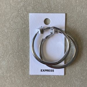 New with tags. Loop earrings